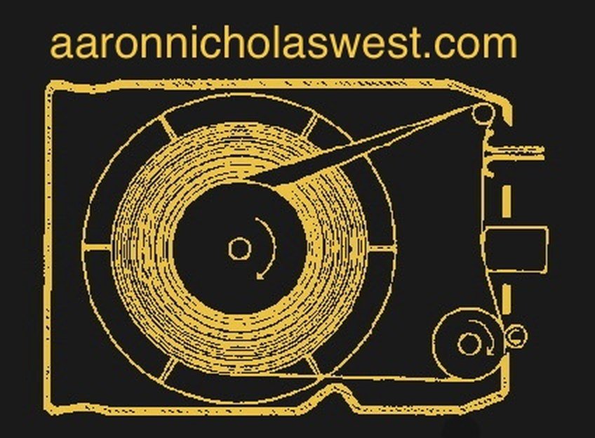 Tape cartridge sticker in yellow on black with aaronnicholaswest.com